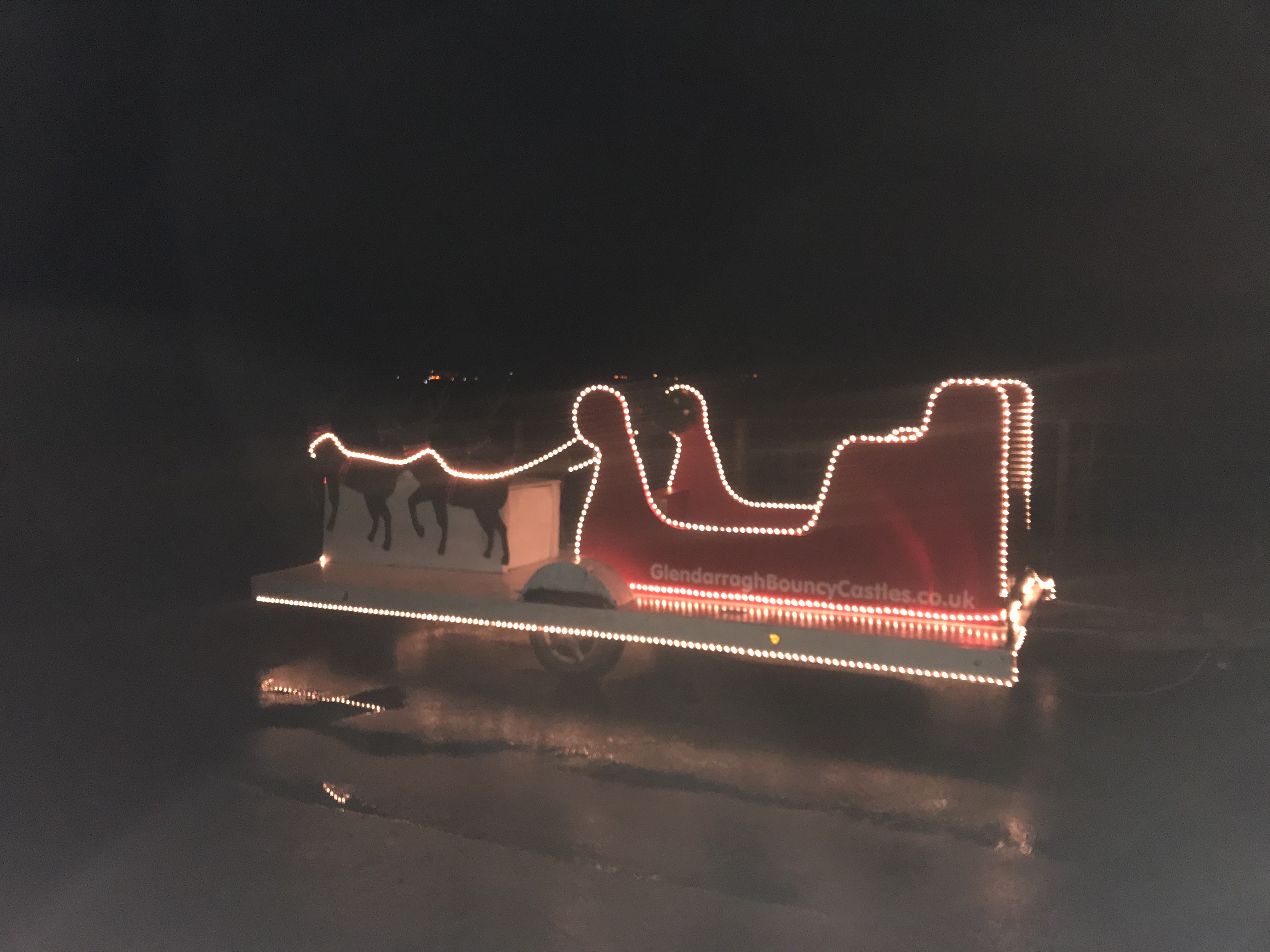 Santa’s Sleigh lit up at night Santa’s Sleigh lit up at night